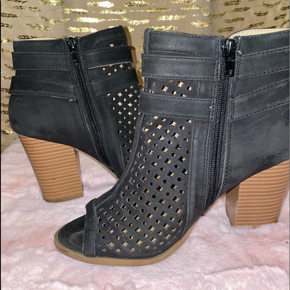 Brash heeled shoes with side zippers and decorative buckles in size 8 1/2